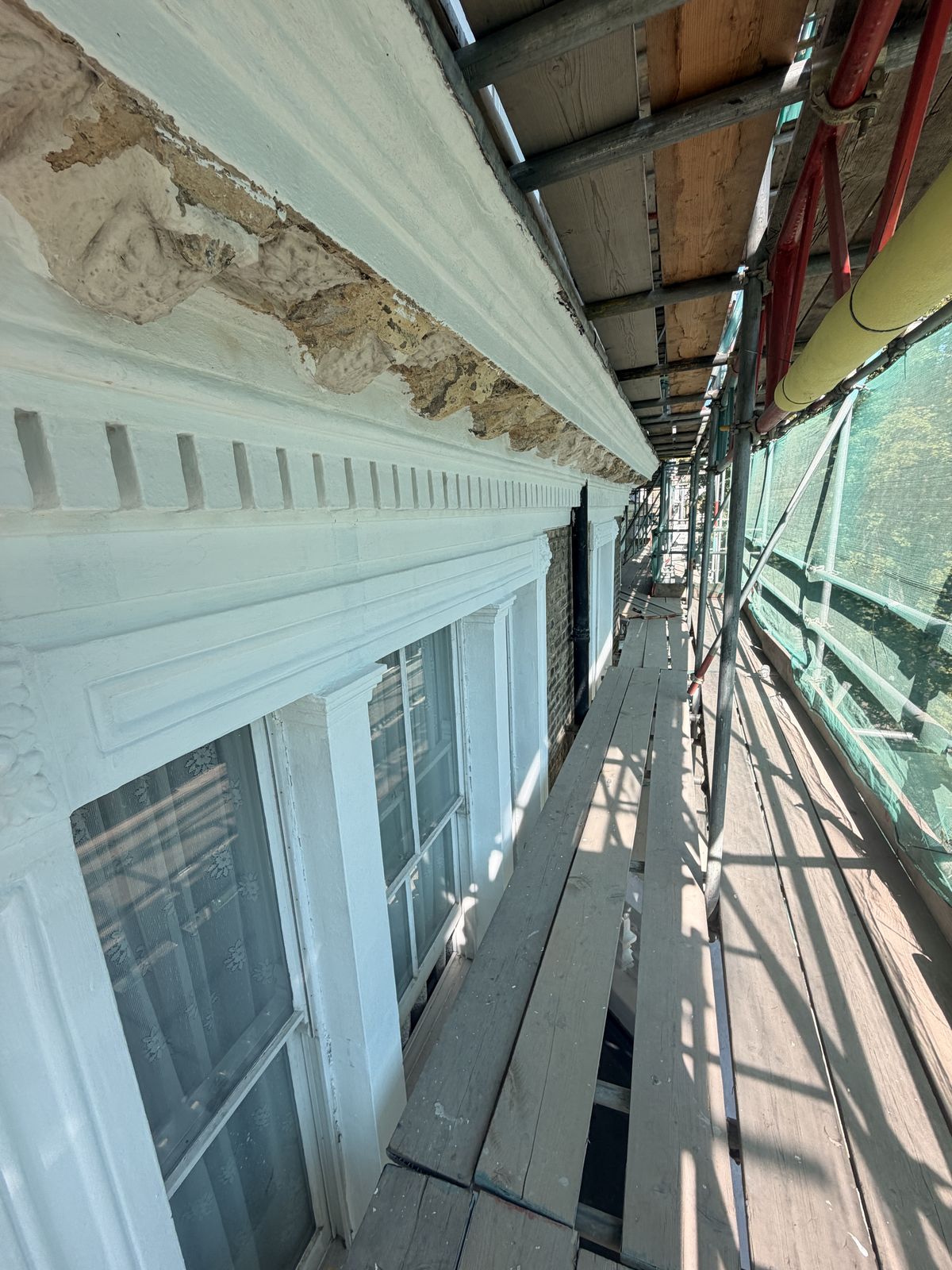 Completed cornice run after restoration and decoration