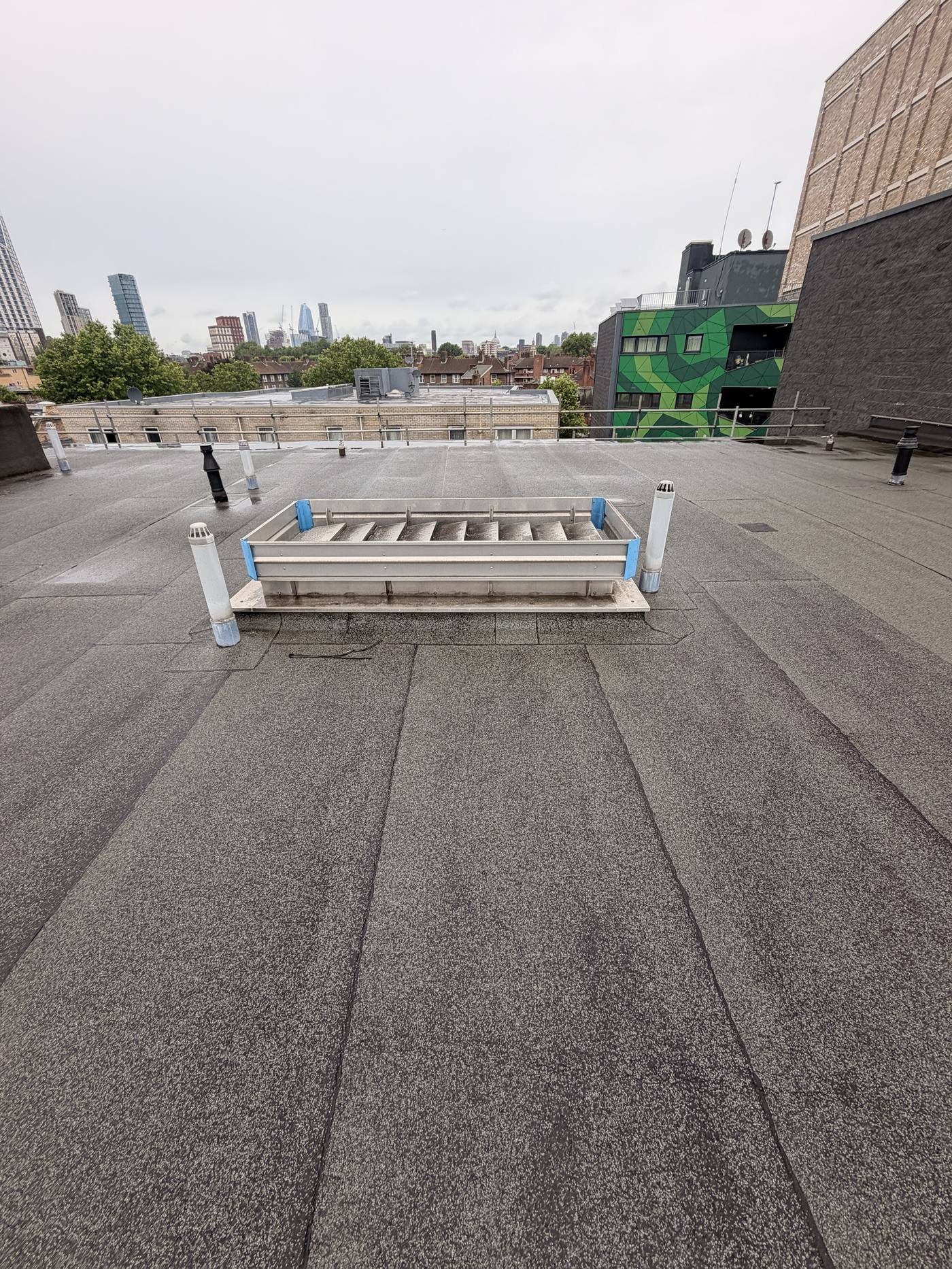 Main flat roof area prior to overlay works